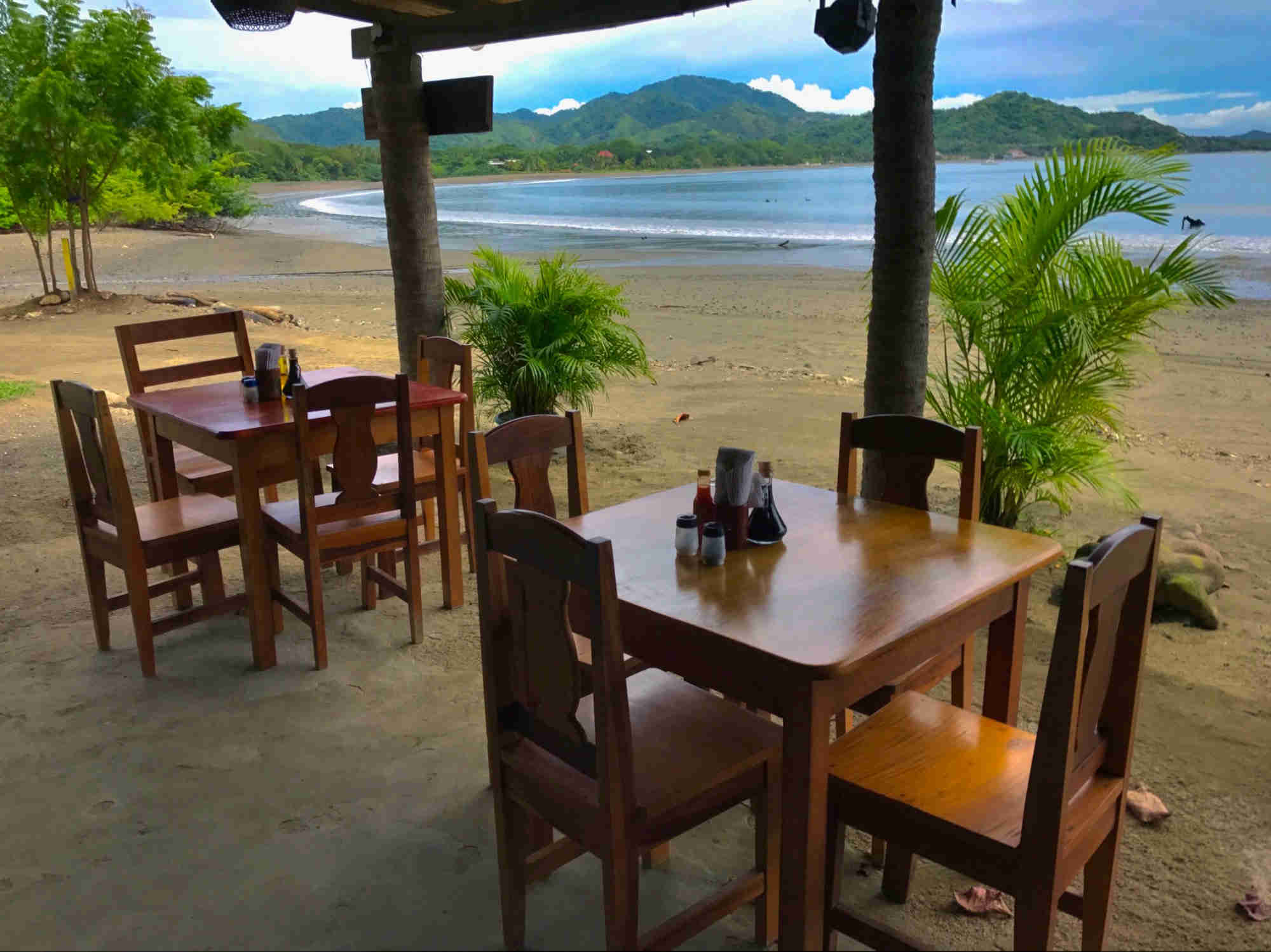 Beachfront Restaurant in Playa Potrero - Tables in the sand waiting for you to come sit