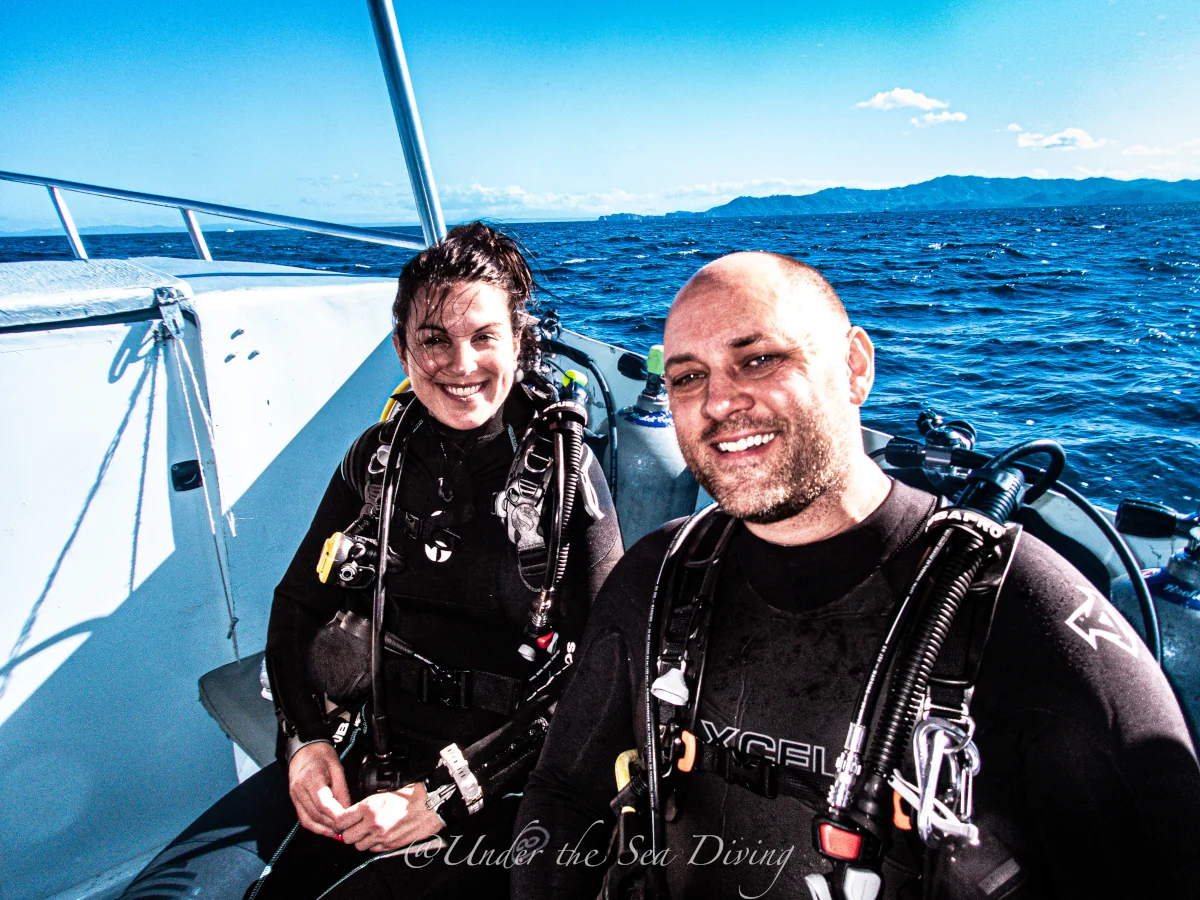 Divers gearing up on the Ariel I dive boat off the coast of Playa Potrero, Guanacaste.