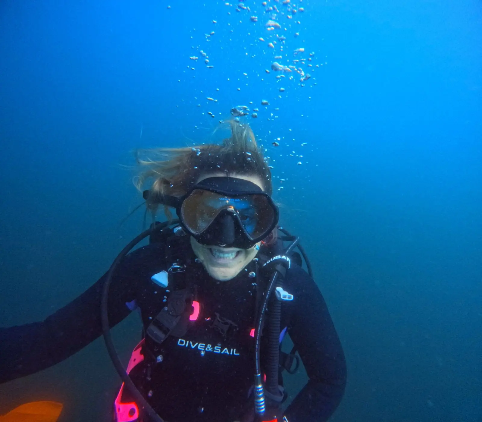 Newly certified PADI divers with their instructor at Under The Sea Diving in Guanacaste, Costa Rica